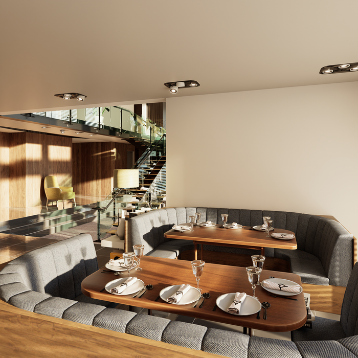 Elegant restaurant interior featuring cozy seating and sleek design elements.